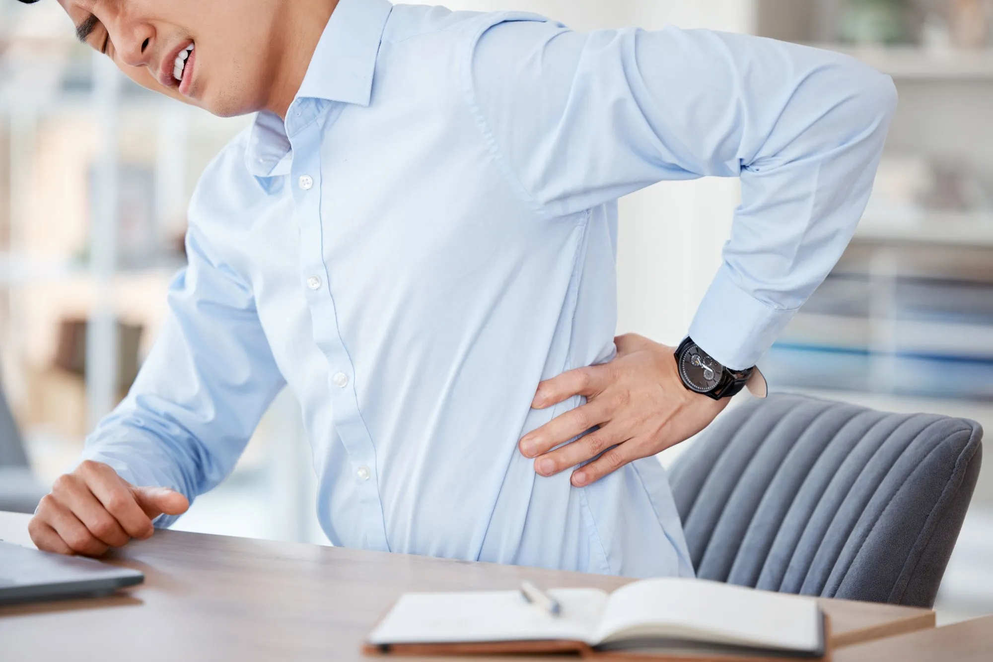 Therapy treatment for neck and upper back pain caused by desk work