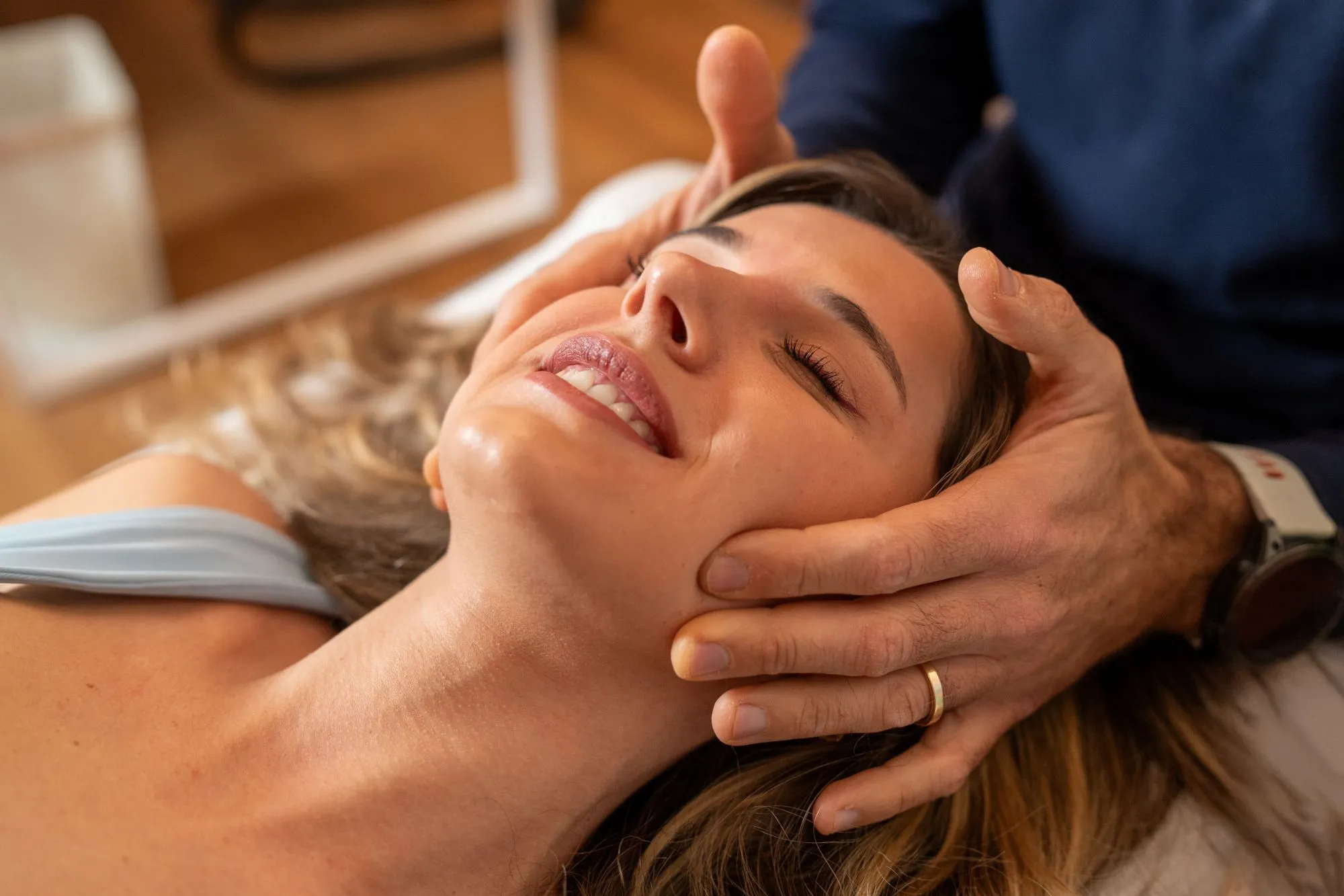 Healthcare practitioner discussing a multi-therapy treatment approach with a client